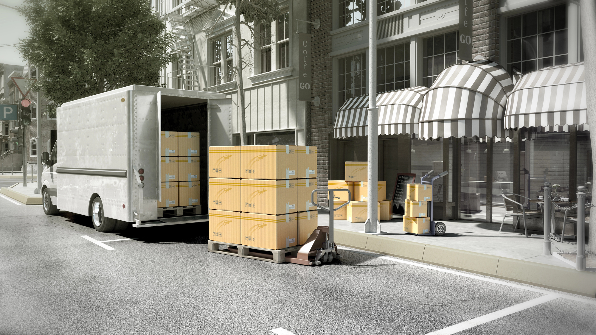 A delivery truck is parked on a city street with yellow boxes being unloaded onto the sidewalk using a pallet jack in front of a café with striped awnings.